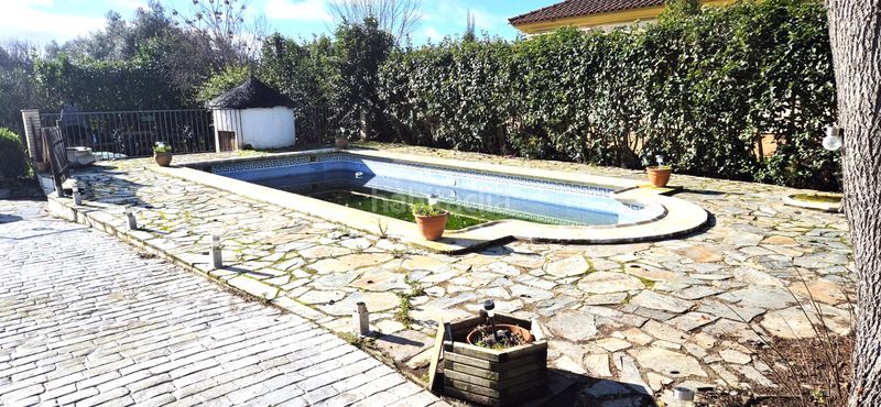 Foto d5bd2d2c-3d7d-4a61-8829-8c35997f44ae. Xalet amb xemeneia calefacció aparcament piscina a Badajoz