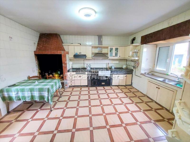 Foto 06027eb9-4ef7-4cf3-992d-71b848b556cc. Casa amb aparcament a Muxía