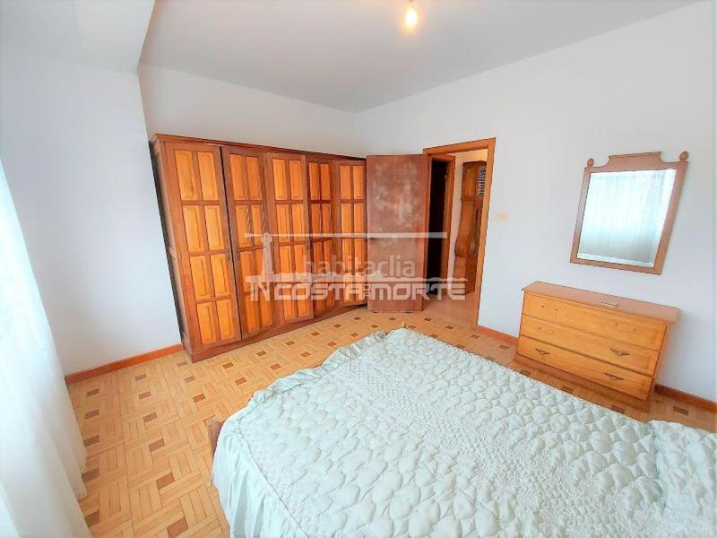 Foto 0baa4ee5-0a4e-44ae-8c03-49ca785990fb. Casa amb aparcament a Muxía