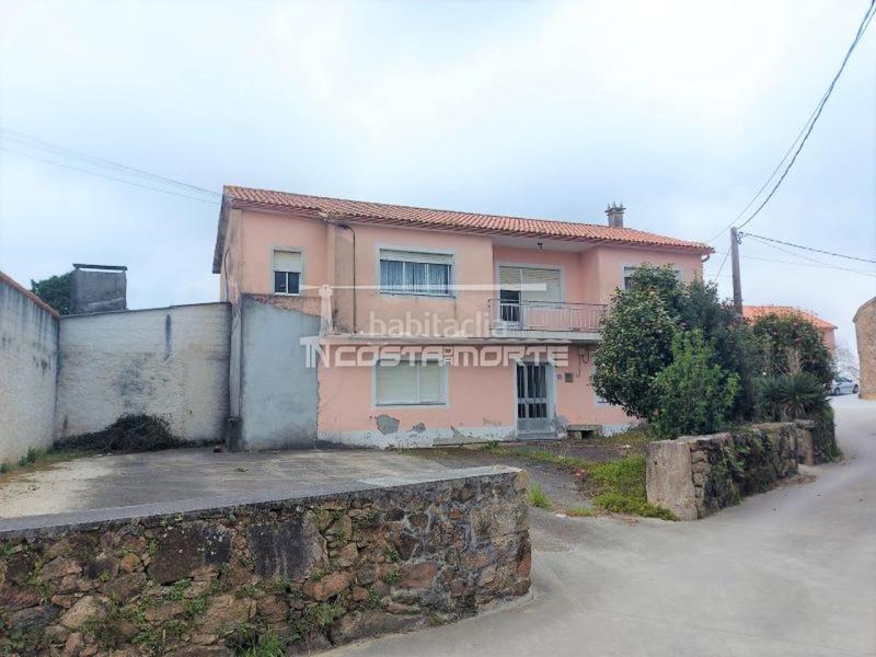 Foto 91faf11b-b32a-4015-aa48-370dc5a27113. Casa amb aparcament a Muxía