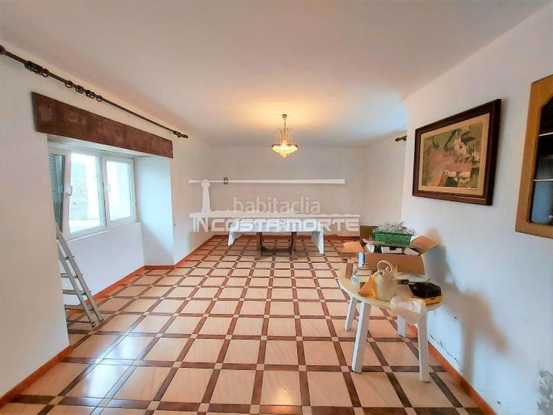 Foto 998b9259-e50a-4ddf-b143-d861fe6e1884. Casa amb aparcament a Muxía