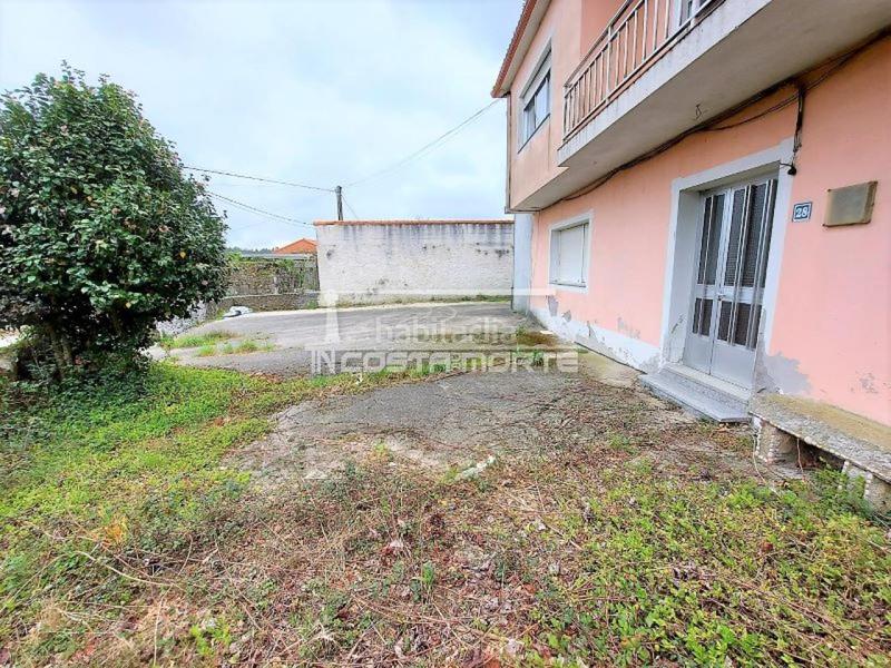 Foto bdc63071-07ff-4f2d-b965-b8fa4f590c65. Casa amb aparcament a Muxía