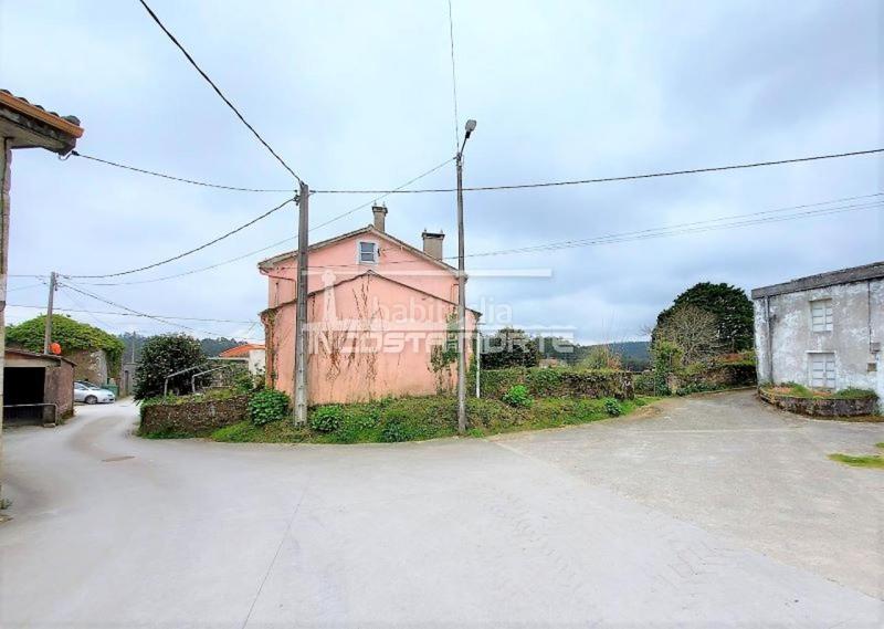 Foto e7357258-3d86-48bc-87b6-fc0e90616f44. Casa amb aparcament a Muxía