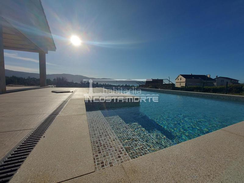 Foto 7b5e1c14-d3be-4851-a0d9-718fe172280f. Xalet amb calefacció aparcament piscina a Carnota