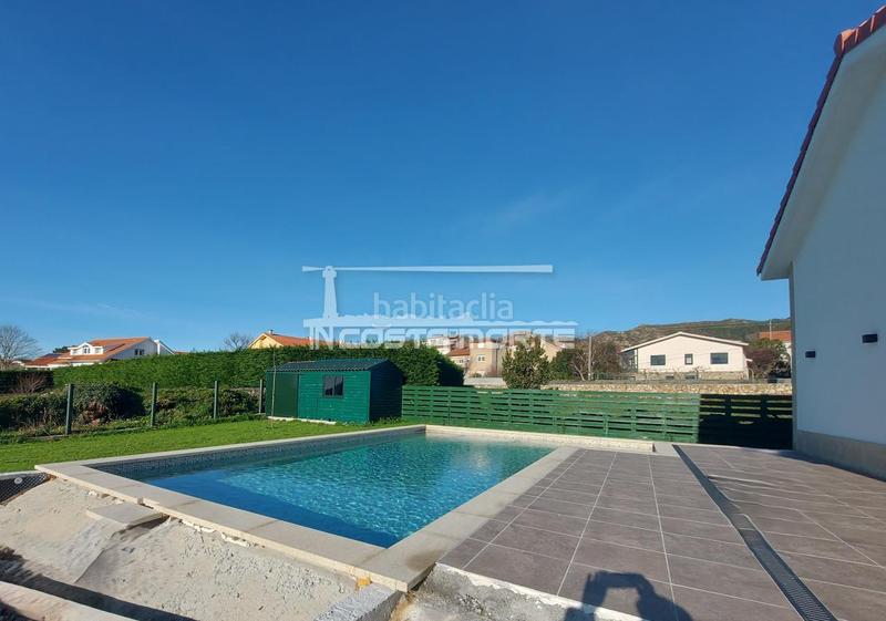 Foto aa829cb7-f5ec-404d-90e5-64bbd4ff42bf. Xalet amb calefacció aparcament piscina a Carnota