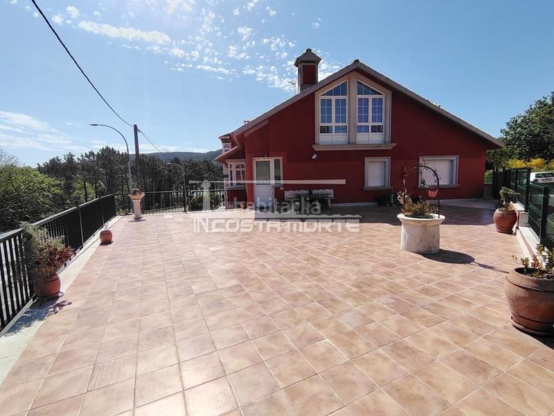 Foto f6eefc89-e738-4086-a373-a74e4782d0b9. Casa adossada amb calefacció aparcament a Fisterra