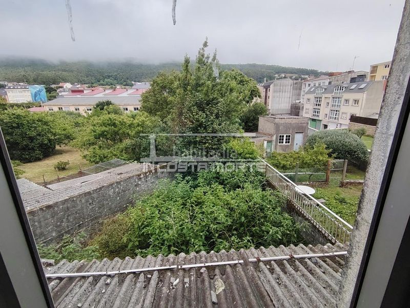 Foto 79bcf82f-38a9-420d-984e-9ba220172520. Casa adossada amb aparcament a Cee