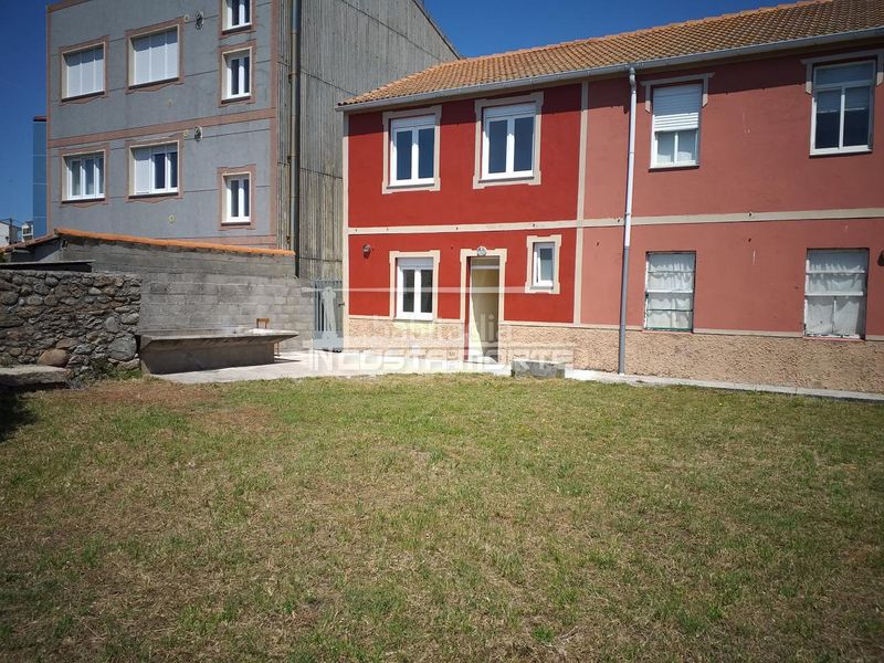 Foto 9da7f59b-6439-4dfe-96e3-bb46273ffcfd. Casa adossada amb calefacció a Muxía