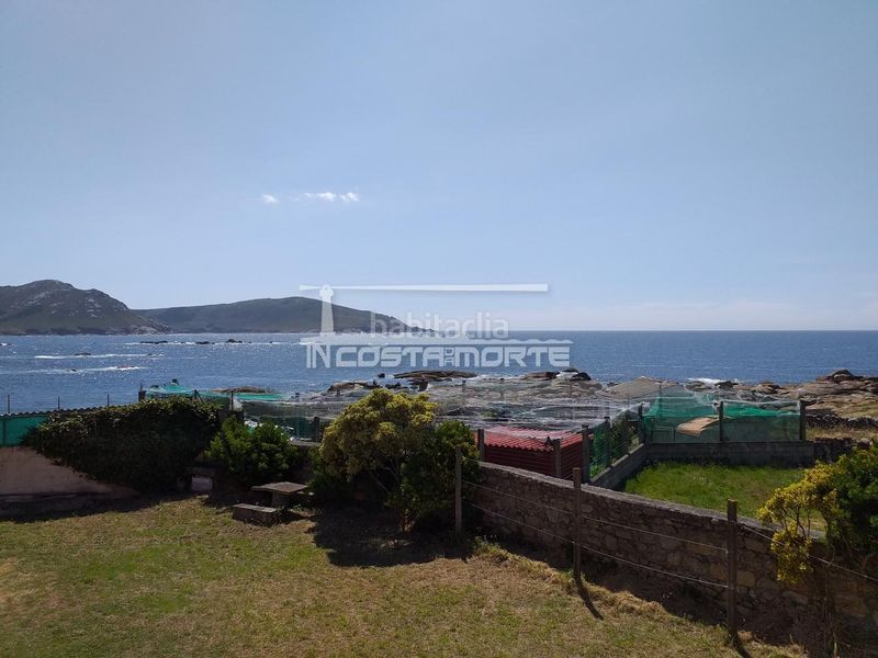 Foto e55b7d32-6587-420c-8e48-0e2b798427de. Casa adossada amb calefacció a Muxía