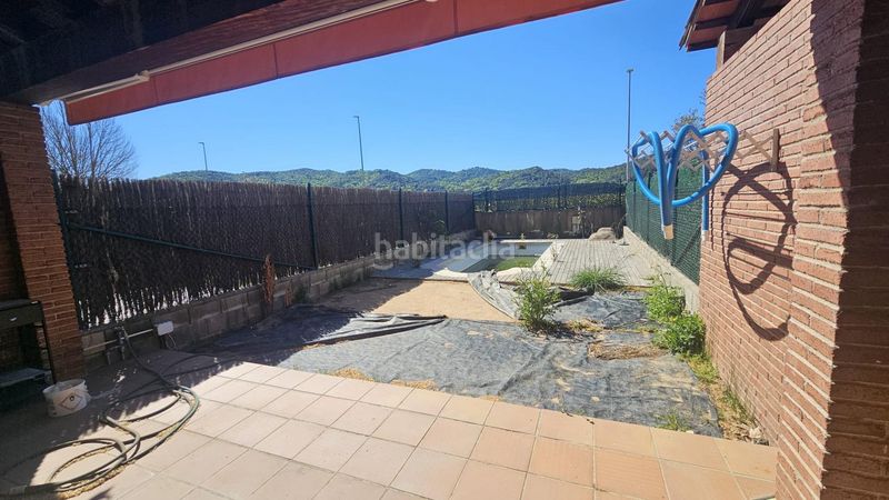 Foto 0b397971-4504-4f12-9921-f8c30dd8d4bf. Casa adossada amb aparcament piscina a Bescanó