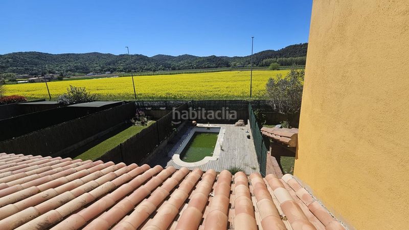 Foto 48c98c90-b770-41e0-8f67-ac924c72826c. Casa adossada amb aparcament piscina a Bescanó