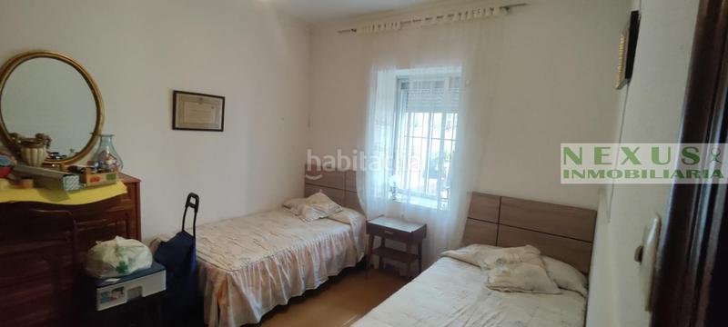 Foto f1dd9091-75c9-40a7-8943-76a8a5b522f1. Maison jumelée dans Casco Antiguo Cáceres