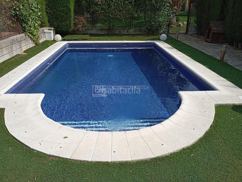 Foto ac737ac7-b77c-4593-bf21-18ba2af22755. Casa adossada amb calefacció aparcament piscina a Cáceres