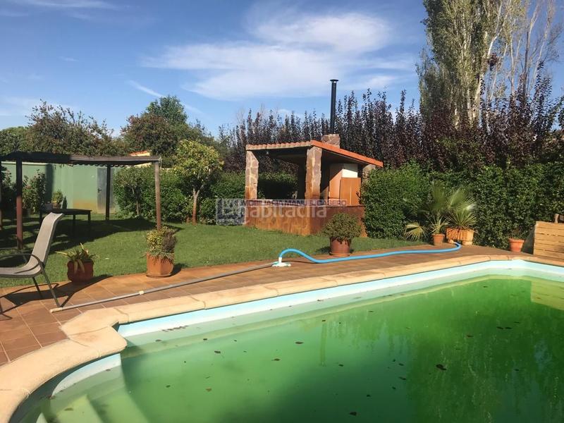 Foto cc4d038d-a662-4a0a-8282-eb94feb00e9e. Xalet amb calefacció aparcament piscina a Ceres Golf Cáceres