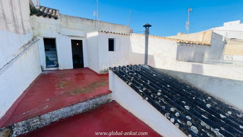 Foto 632ba3f6-e7cb-4fe9-a9bc-1f2aed45a880. Casa adosada típica casa mallorquina (ref. c20290) en Felanitx