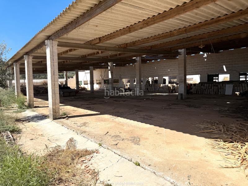 Foto 0f6d9afe-9612-4512-855a-6812d5e9cb07. Masia amb xemeneia a Porreres