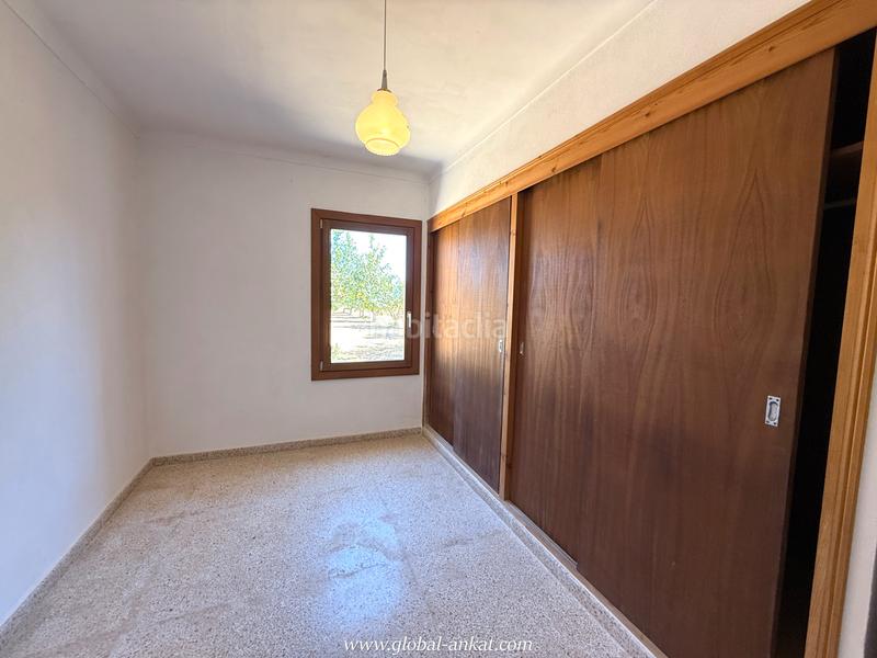 Foto 37719c2b-85ec-43ba-bb42-ec10ed4cad2a. Masia amb xemeneia a Porreres