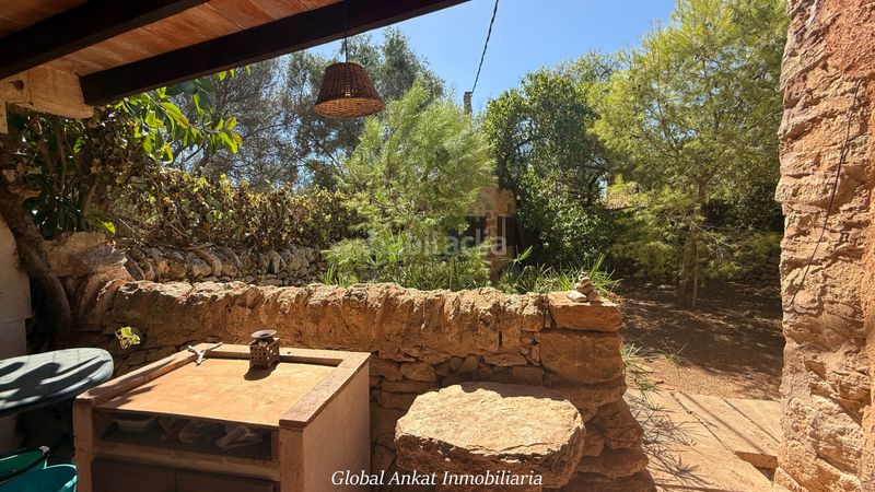 Foto 9a4a33e1-6f50-4f30-8ddf-565b0baeb2af. Masía exclusiva finca rústica tradicional con piscina y casa de invitados a minutos (ref. f2087) en Santanyí