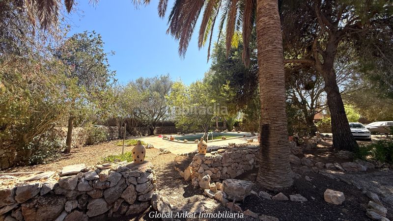Foto f8b76c5b-fc04-459b-b92e-c47fdeb4badd. Masía exclusiva finca rústica tradicional con piscina y casa de invitados a minutos (ref. f2087) en Santanyí