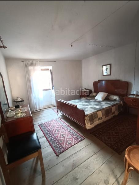 Foto 04c602ec-557a-4f73-92af-35c2bb490357. Casa aparellada a Villasur de Herreros