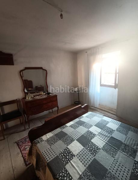 Foto f52e348e-6021-4913-bbc3-03c73d5990df. Casa aparellada a Villasur de Herreros