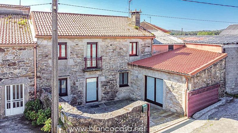 Foto 1af8876b-a5cb-456f-8b4e-1f73ab3f9fd4. Haus mit heizung in Vimianzo