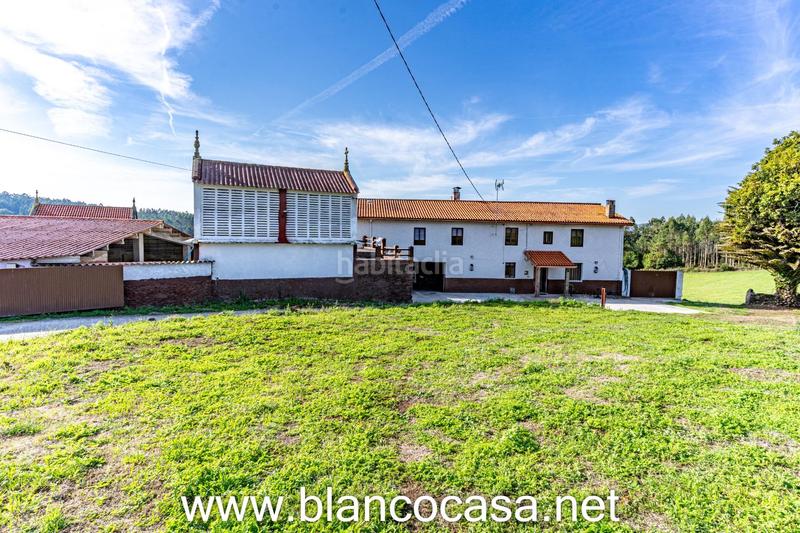 Foto 174abd25-8af5-4d7d-b523-faf8bc340155. Haus mit heizung parking in Carballo