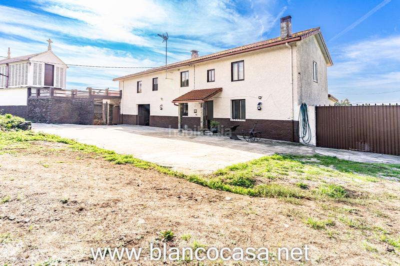Foto 9fc51af6-87ff-4175-8db9-07d6039708d7. Haus mit heizung parking in Carballo