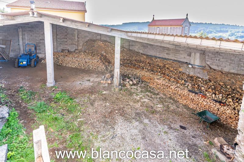 Foto e1d3e69d-10bb-4803-86a7-f83c4f9af9ee. Haus mit heizung parking in Carballo