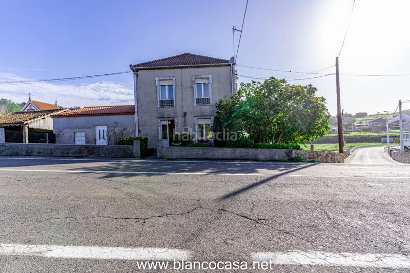 Foto 2af004bc-8377-47b0-848b-272c5406277a. Casa amplia casa con terrenazo en tella en Ponteceso
