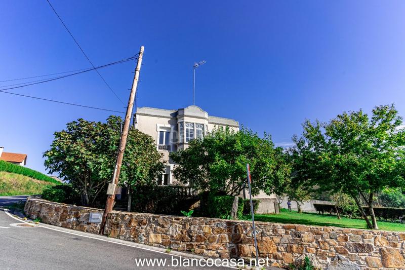 Foto abb9459a-e5cd-4149-8a0b-01200ec4f28d. Casa amplia casa con terrenazo en tella en Ponteceso