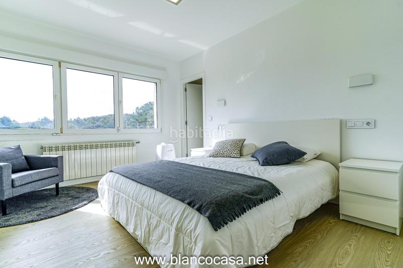 Foto 5081e67e-b4ee-492b-a822-be9355d99e88. Casa lujosa, moderna y con un gran terreno en Carballo