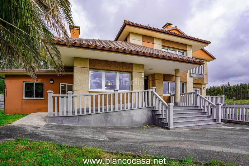 Foto 6c799013-24c5-471d-9d55-490b7d9458bc. Casa lujosa, moderna y con un gran terreno en Carballo