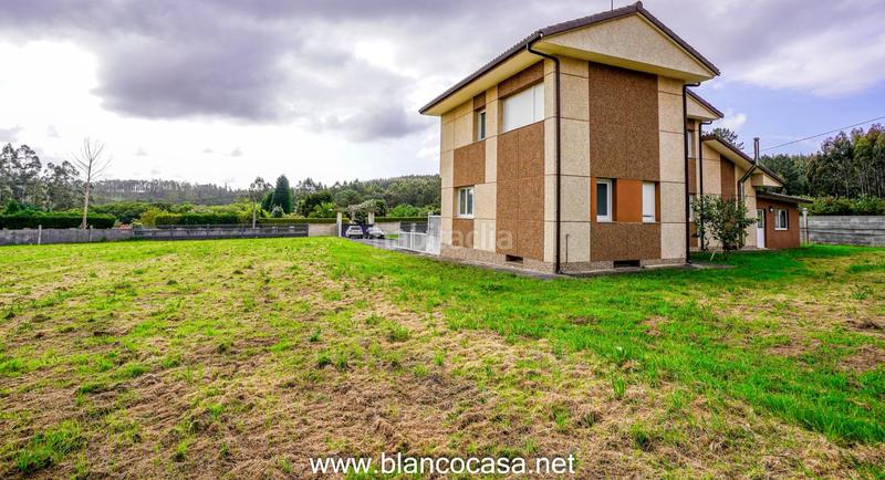 Foto b7c7d909-1a5b-46c3-941f-25ee197d40d9. Casa lujosa, moderna y con un gran terreno en Carballo
