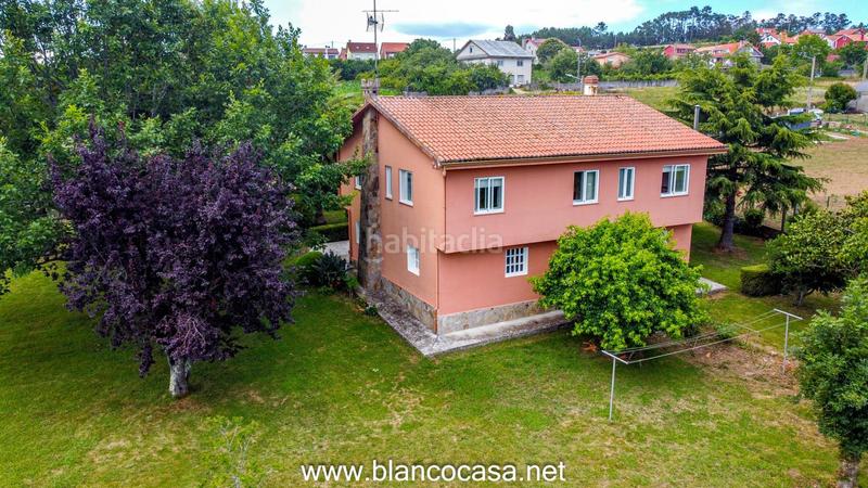 Foto 358a30d5-b0b2-4f8c-b6af-e2219b85a256. Casa  con terreno en Carballo