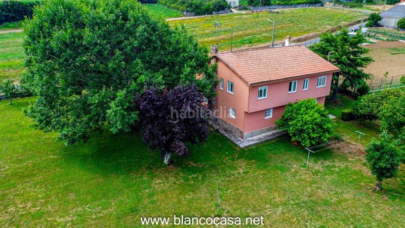 Foto 503faaed-96cf-4b16-96ec-129efd9246ea. Casa  con terreno en Carballo