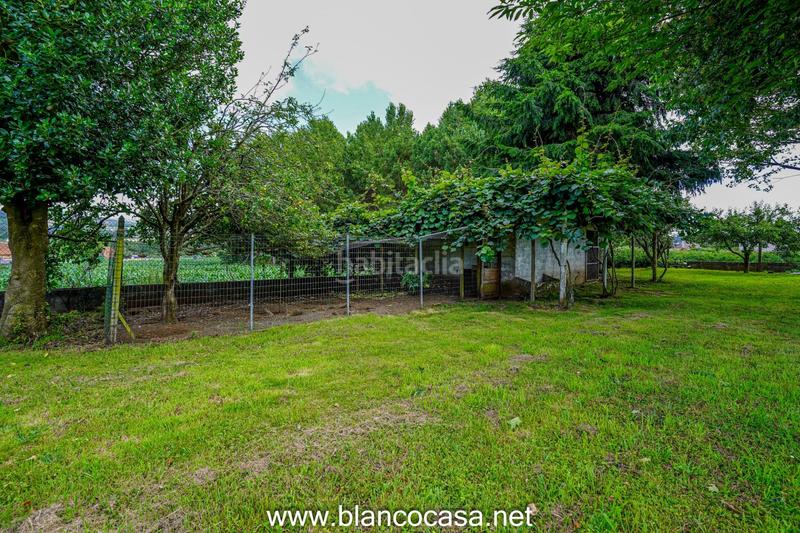 Foto ac759bd3-caa2-40b9-b575-2da965ffce1b. Casa  con terreno en Carballo