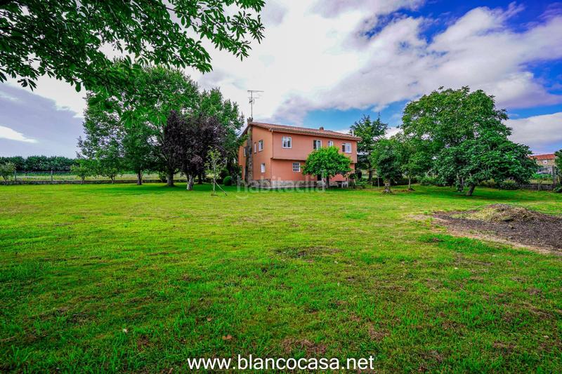 Foto bc05605f-ac11-47e0-abe5-56fe9a908598. Casa  con terreno en Carballo