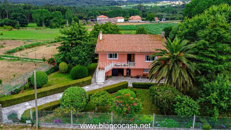 Foto bc324f64-f9c1-4807-8d3c-7e7a51d629ad. Casa  con terreno en Carballo
