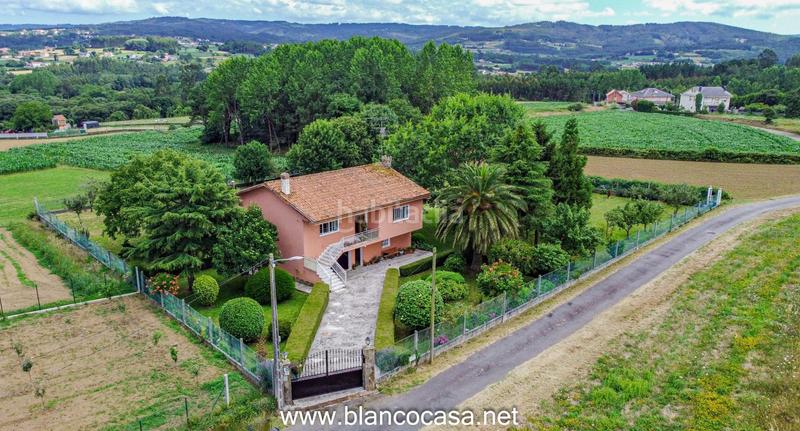 Foto ce7fd827-8ce9-4917-a9de-085c3a417cb0. Casa  con terreno en Carballo