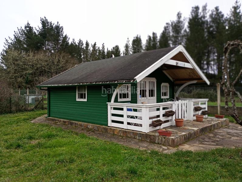 Foto be886856-0dd2-4a72-b62a-042eb4eff3a2. Casa casita de madera con terreno en Pobra do Brollón (A)