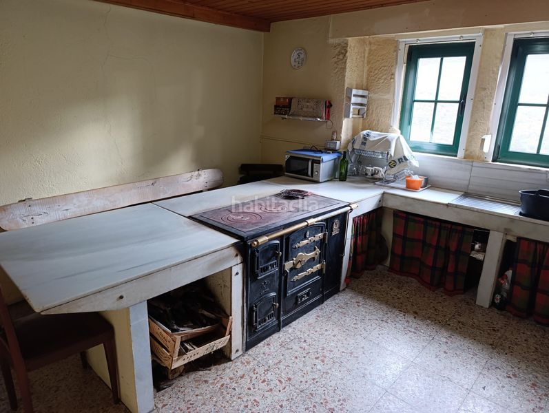 Foto a15691c6-8722-4179-9b19-5d0d0172ae2b. Casa amb xemeneia aparcament a Taboada