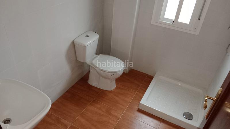 Foto f0ec585a-40dd-4643-814f-b9e8d2b7e61c. Casa adosada adosado en Fregenal de la Sierra