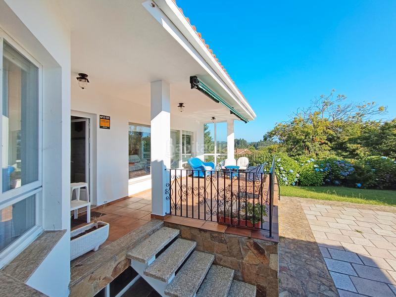 Foto 1a8630a2-90cd-4d45-b0bd-1fb5795ec7da. Chalet *** una casa con personalidad en el centro *** en Oleiros