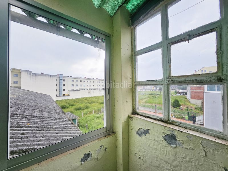 Foto a8d5f314-02d8-46e8-80ca-e8f33d0df56c. Casa aparellada amb aparcament a Laracha
