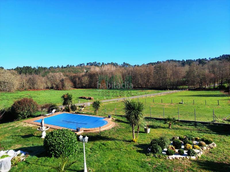 Foto 9acaf2aa-59d2-4c5d-b78d-77ab1f041e81. Chalet con riscaldamento parcheggio piscina in San Cibrao das Viñas