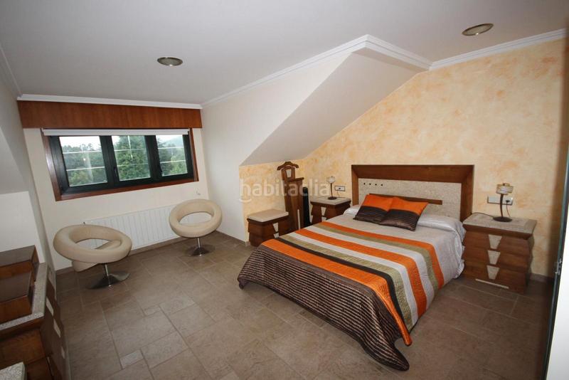 Foto 6f68118f-0e90-4425-a814-091625d6f511. Chalet avec cheminée chauffage parking dans Oseiro Arteixo