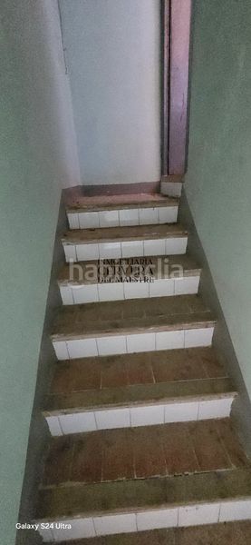 Foto 65e49a8a-d02a-470c-b8e3-e27cce81d724. Casa adossada a Xert