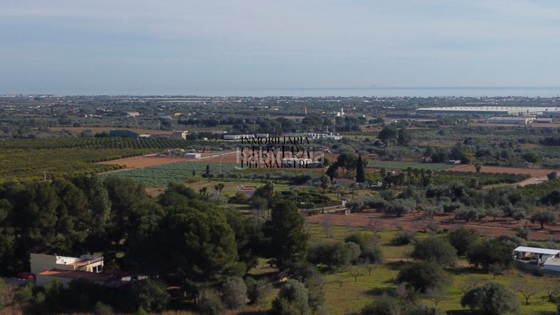 Foto 5c1f428c-122f-4108-9f19-143a68b11839. Finca rústica finca rustica para edificar ubicada a 7kms desde el centro benicarlo y la playa en Benicarló