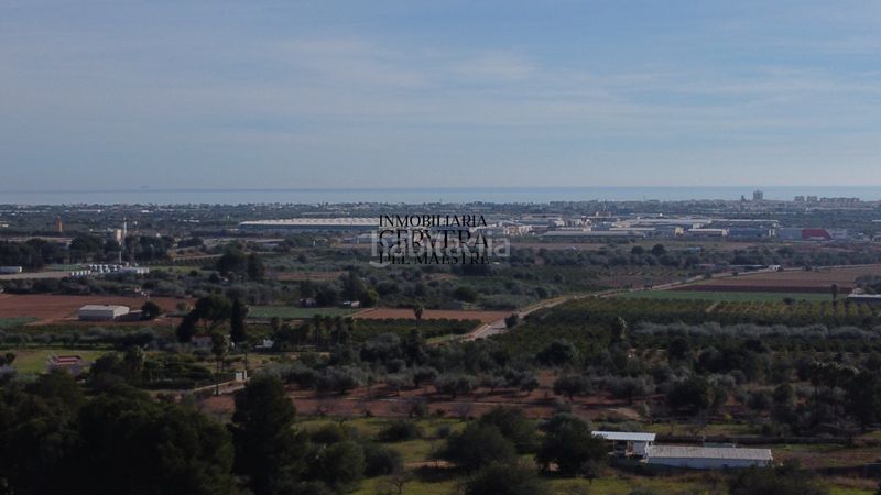 Foto b19a0013-b727-453d-bf3b-9302fe4290dd. Finca rústica finca rustica para edificar ubicada a 7kms desde el centro benicarlo y la playa en Benicarló